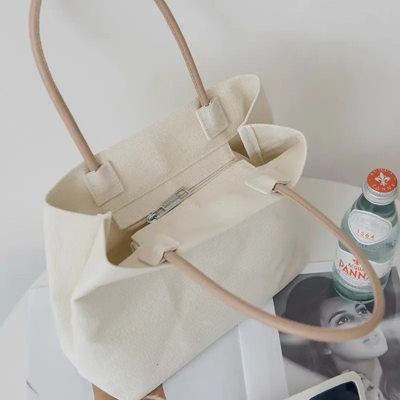 Solid Canvas Handbag for Women 2023 Summer Korean Version Small Handbag Lunch Bag Fashion All-match Purses and Handbags
Solid Canvas Handbag for Women 2023 Summer Korean Version Small Handbag Lunch Bag Fashion All-match Purses and Handbags