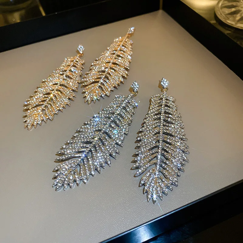 New Arrival Luxury Designer Full Rhinestone Feather Leaf Tassel Earrings For Women Statement Jewelry Shine Zirconia Pendientes
New Arrival Luxury Designer Full Rhinestone Feather Leaf Tassel Earrings For Women Statement Jewelry Shine Zirconia Pendientes