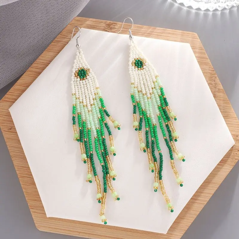 Women Bohemian Earring Fashion Colorful Long Tassel Beaded Earring Ethnic Beads Earring Jewelry Wholesale 2022 Trendy Earring
Women Bohemian Earring Fashion Colorful Long Tassel Beaded Earring Ethnic Beads Earring Jewelry Wholesale 2022 Trendy Earring