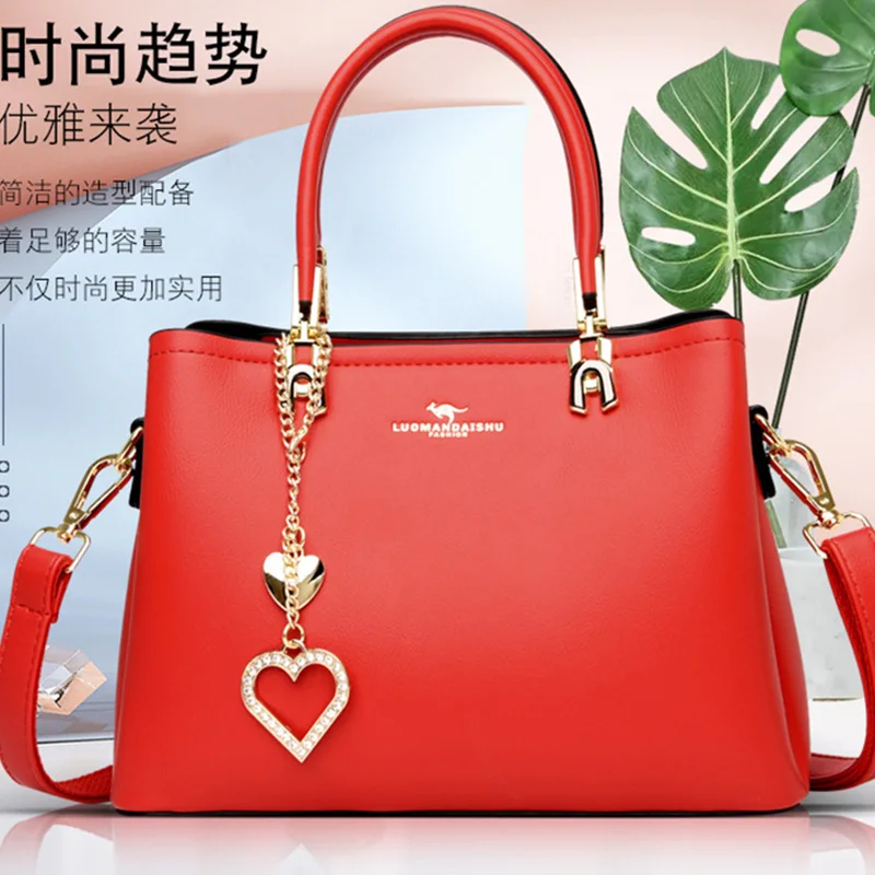 Women's New Shoulder Bags Luxury Top Layer Cowhide Tote Bag Classic Heart Pendant Handbag Female Casual Brand Design Shopper Bag
Women's New Shoulder Bags Luxury Top Layer Cowhide Tote Bag Classic Heart Pendant Handbag Female Casual Brand Design Shopper Bag