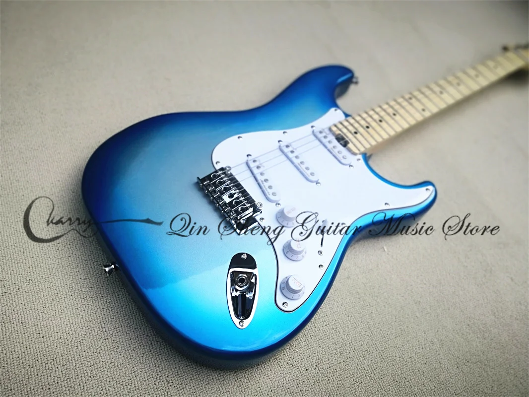 Blue Electric Guitar, Silver Stra Guitar, Small Tremolo Bridge, Maple Fingerboard, Locked Buttons
Blue Electric Guitar, Silver Stra Guitar, Small Tremolo Bridge, Maple Fingerboard, Locked Buttons
