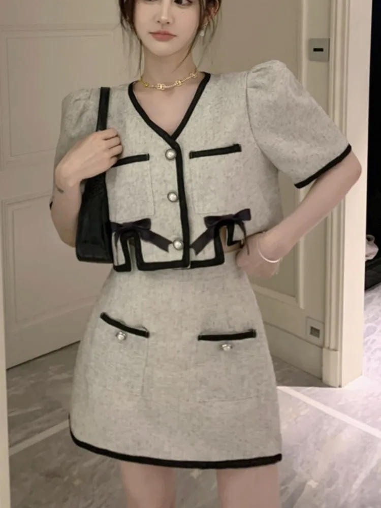 Корейские милые маленькие ароматные комплекты из 2 предметов, женская одежда, летний укороченный топ с бантом и юбка, элегантные костюмы из двух предметов
Корейские милые маленькие ароматные комплекты из 2 предметов, женская одежда, летний укороченный топ с бантом и юбка, элегантные костюмы из двух предметов