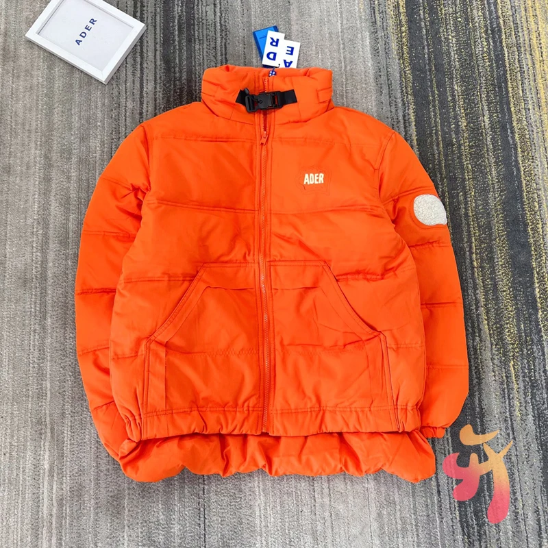 Мужская и Женская куртка-пуховик Adererror толстые оранжевые теплые пальто-пуховики на утином пуху 
Мужская и Женская куртка-пуховик Adererror толстые оранжевые теплые пальто-пуховики на утином пуху