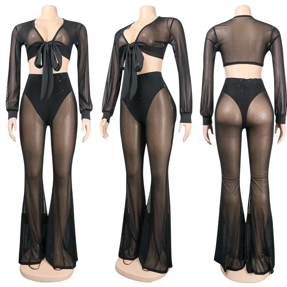 UK2288 women's sexy two-piece fashion solid color long-sleeved hot drill perspective gauze short top + flared pants suit women
UK2288 women's sexy two-piece fashion solid color long-sleeved hot drill perspective gauze short top + flared pants suit women