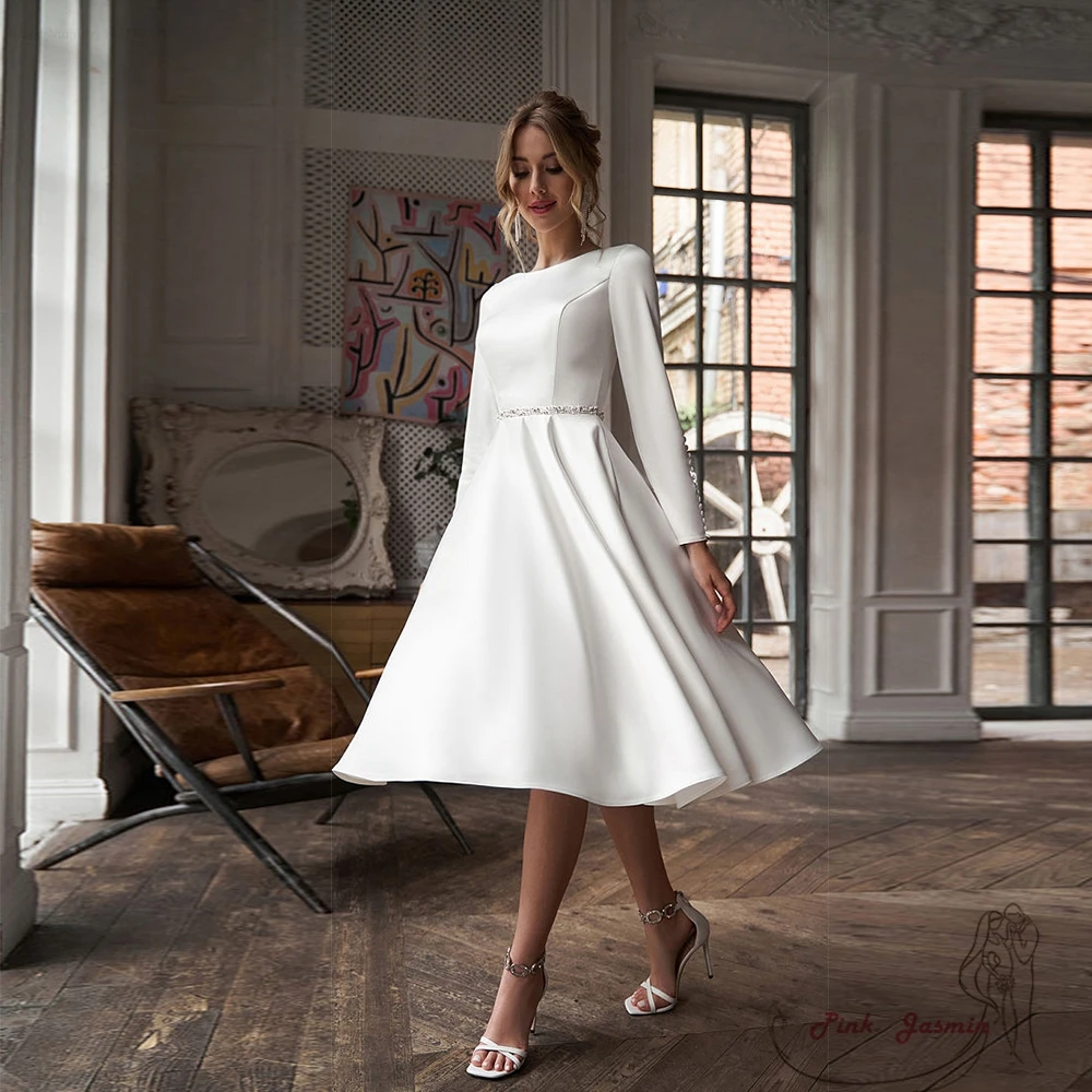 Full Sleeve Satin Wedding Dresses with Beading A Line Knee Lenth Button Back Bridal Gowns for Marriage 2023 Robe De Mariée
Full Sleeve Satin Wedding Dresses with Beading A Line Knee Lenth Button Back Bridal Gowns for Marriage 2023 Robe De Mariée