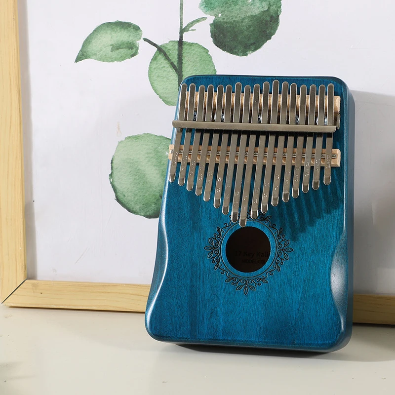 17 Keys Kalimba Thumb Piano High Quality Wood Mahogany Africa Finger Piano Body Musical Instruments With Learning Book
17 Keys Kalimba Thumb Piano High Quality Wood Mahogany Africa Finger Piano Body Musical Instruments With Learning Book
