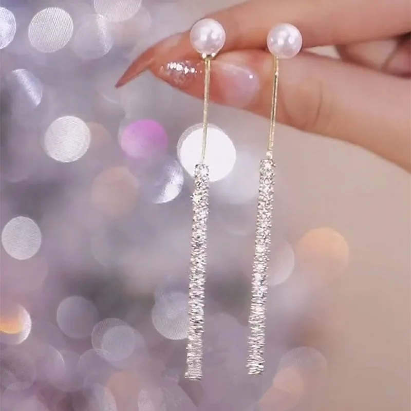 Fashion Trend Advanced Light Luxury Long Pearl Tassel Zirconia Delicate Earrings Women Jewelry 2023 New Wedding Party Gifts
Fashion Trend Advanced Light Luxury Long Pearl Tassel Zirconia Delicate Earrings Women Jewelry 2023 New Wedding Party Gifts