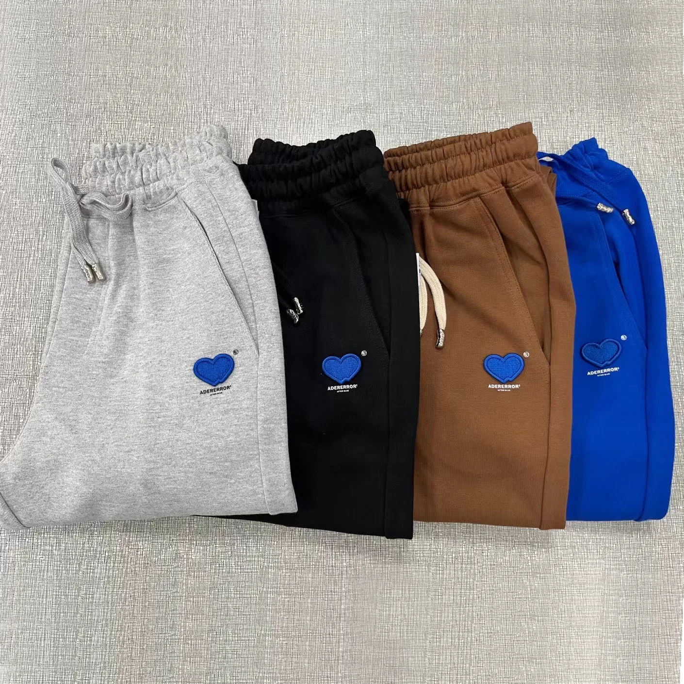 ADER ERROR Korean High Quality Double Heart Embroidered Sports Pants Loose Casual Men's and Women's Trousers Couple Sweatpants
ADER ERROR Korean High Quality Double Heart Embroidered Sports Pants Loose Casual Men's and Women's Trousers Couple Sweatpants