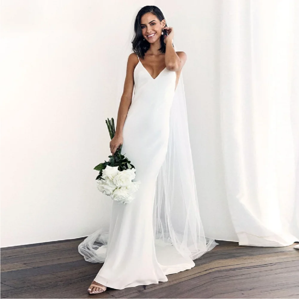 Sexy Spaghetti Straps Mermaid Wedding Dress V-Neck Simple Sleeveless Open Back Beach Bridal Gown Robe De Mariee
Sexy Spaghetti Straps Mermaid Wedding Dress V-Neck Simple Sleeveless Open Back Beach Bridal Gown Robe De Mariee