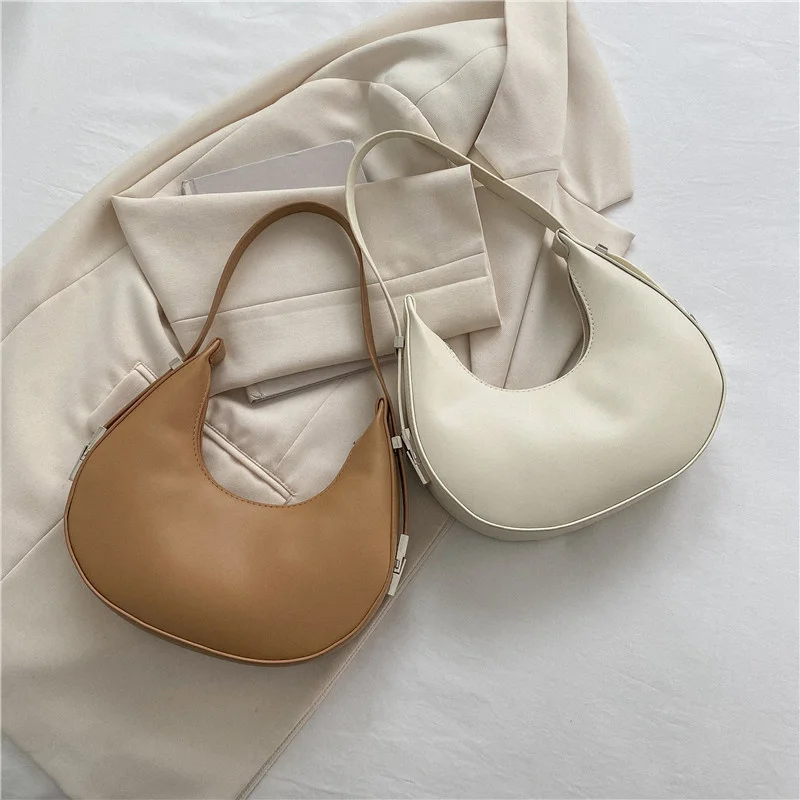 Fashion Style Half-moon Handbag For Women PU Leather Shoulder Bag Gilrs Underarm Bag Designer Portable Handle Bag and Purse Tote
Fashion Style Half-moon Handbag For Women PU Leather Shoulder Bag Gilrs Underarm Bag Designer Portable Handle Bag and Purse Tote