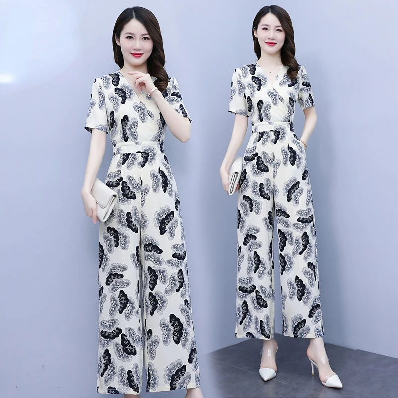 Summer Short Sleeve Floral Printed Jumpsuits with Belt 2023 Women Vintage Wide Leg Rompers Casual Overalls Loose Playsuits S83
Summer Short Sleeve Floral Printed Jumpsuits with Belt 2023 Women Vintage Wide Leg Rompers Casual Overalls Loose Playsuits S83