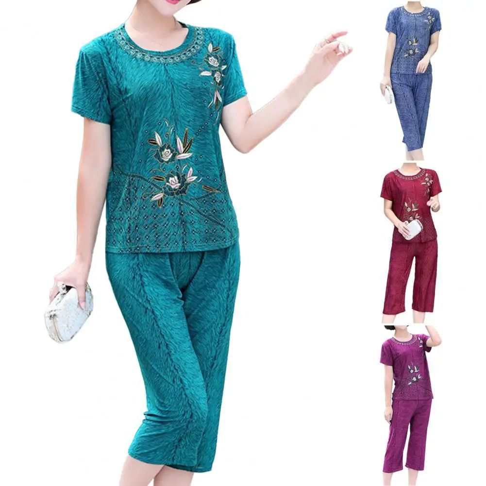 Summer Women Pajamas O Neck Floral Print Short Sleeve T-shirt Pants Loose Outfit for Middle-aged
Summer Women Pajamas O Neck Floral Print Short Sleeve T-shirt Pants Loose Outfit for Middle-aged