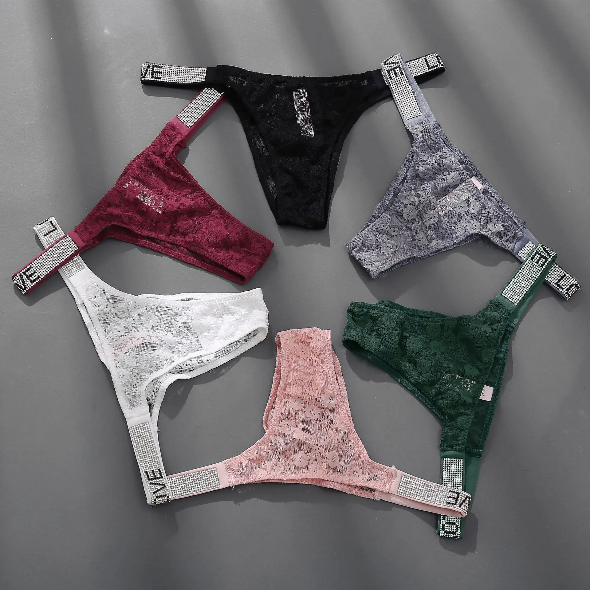 European And American Sexy Rhinestone Letter Lace Underwear Women's Hip Lifting High Waist High Fork T-Shaped Pants Sell
European And American Sexy Rhinestone Letter Lace Underwear Women's Hip Lifting High Waist High Fork T-Shaped Pants Sell