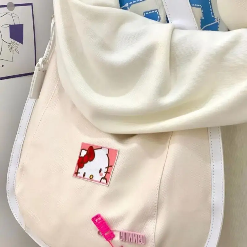 Kawaii Sanriod Anime Hobby Kitty Canvas Bag Women's One-Shoulder Dumpling Tote Bag Large-Capacity Student Class Messenger Bag
Kawaii Sanriod Anime Hobby Kitty Canvas Bag Women's One-Shoulder Dumpling Tote Bag Large-Capacity Student Class Messenger Bag