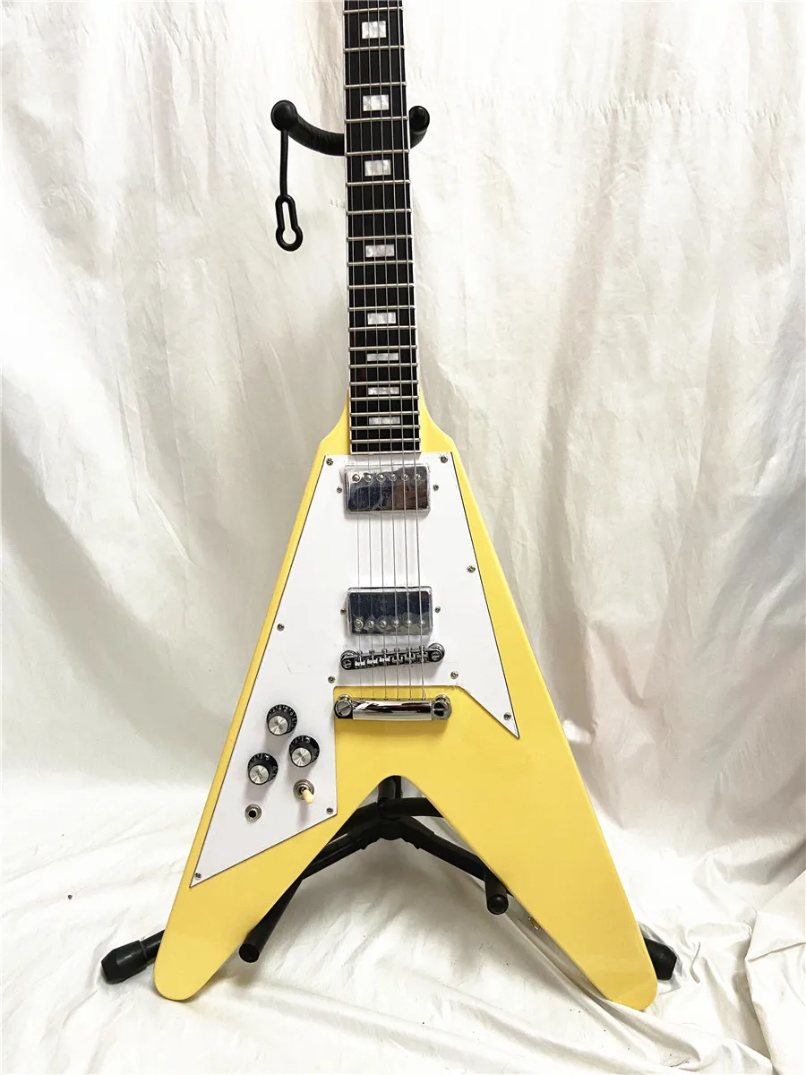 High quality custom edition left hand fork yellow electric guitar white guard plate can be customized free shipping
High quality custom edition left hand fork yellow electric guitar white guard plate can be customized free shipping