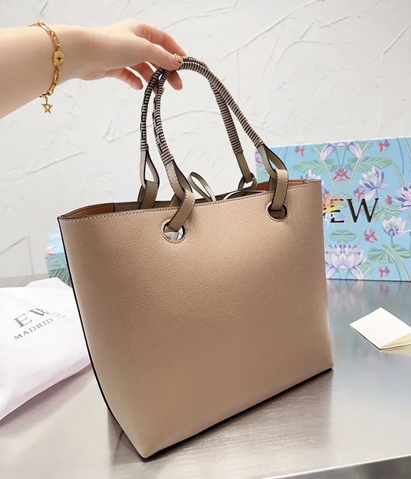 

Brand new handbag Tote best-selling Cowhide Bag Anagram Pressed leather shopping Bag Women's Fashion Shoulder Bag 135#