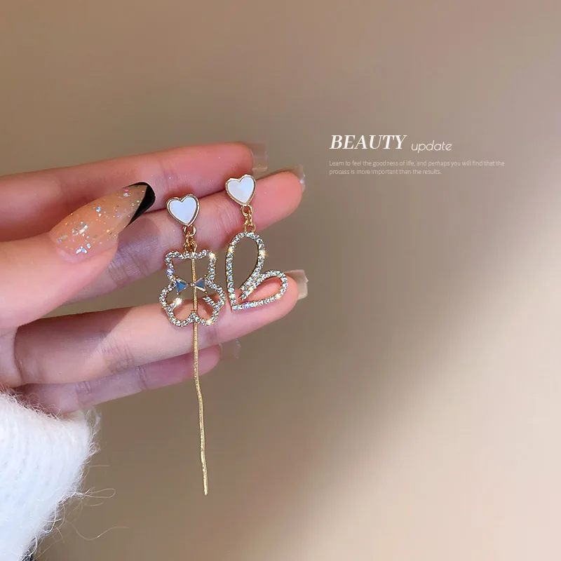 Korean Style Cutout Bear Heart Tassel Earring for Women Trendy AAA Bling Zircon Love Stud Earrings Party Gift for Wholesale
Korean Style Cutout Bear Heart Tassel Earring for Women Trendy AAA Bling Zircon Love Stud Earrings Party Gift for Wholesale