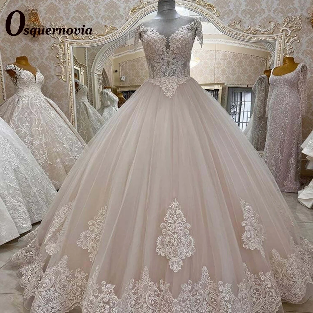 Osquernovia Ball Gown Wedding Dresses For Brides Scoop Lace Appliques Illusion Button Short Sleeve 2023 Tulle Robe De Mariée
Osquernovia Ball Gown Wedding Dresses For Brides Scoop Lace Appliques Illusion Button Short Sleeve 2023 Tulle Robe De Mariée