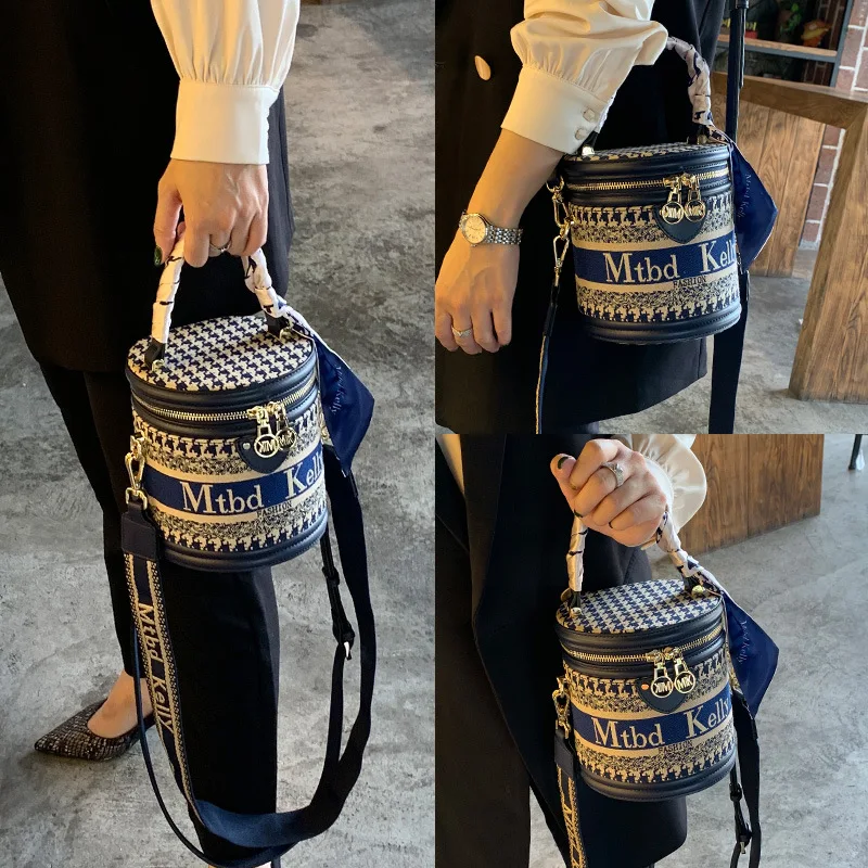 New Fashion Trend Houndstooth Bucket Small Bag Premium Texture Leather + Canvas Versatile Casual Cylindrical Shoulder Handbag
New Fashion Trend Houndstooth Bucket Small Bag Premium Texture Leather + Canvas Versatile Casual Cylindrical Shoulder Handbag