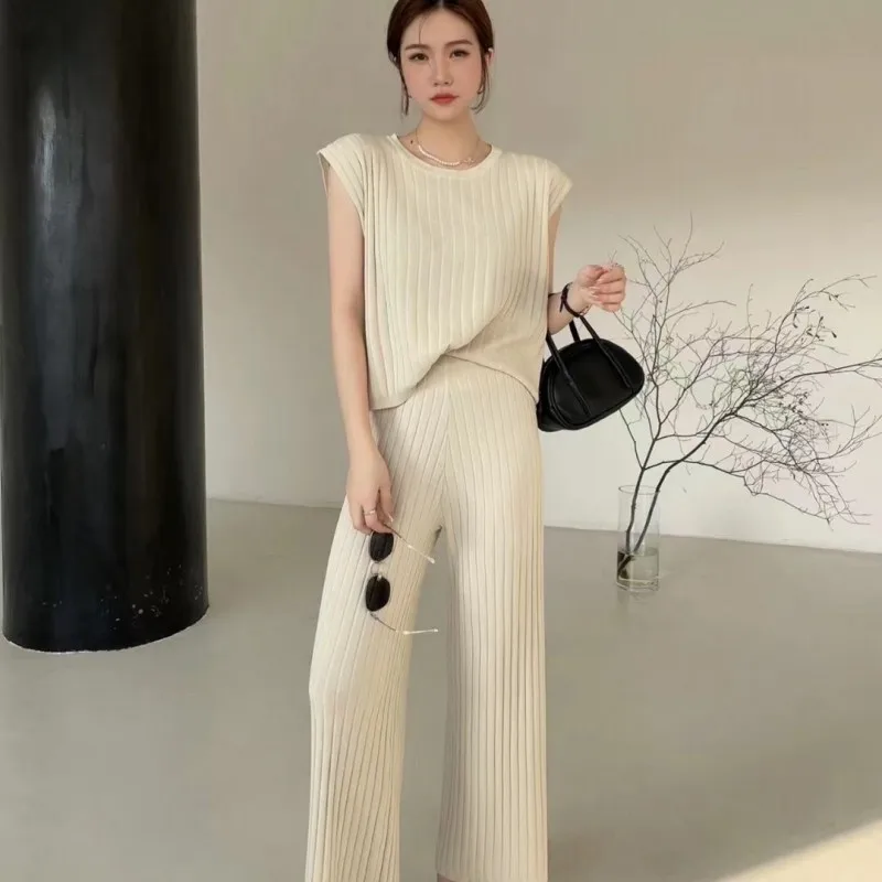 Korean Summer Knitting Female Chic Slouchy Simple Thin Sweater Top + Ice Silk Wide Leg Pants Women't Suit Two Pieces Sets
Korean Summer Knitting Female Chic Slouchy Simple Thin Sweater Top + Ice Silk Wide Leg Pants Women't Suit Two Pieces Sets