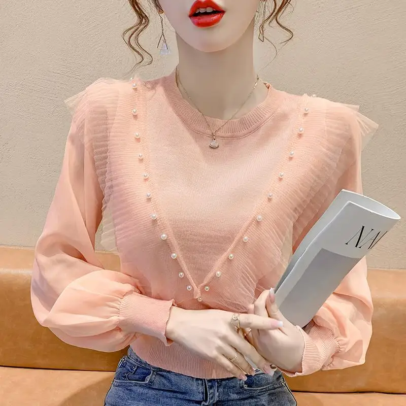Solid pullover stitching lotus leaf nail pearl long -sleeved knit sweater women's summer loose outside wearing knit sweater
Solid pullover stitching lotus leaf nail pearl long -sleeved knit sweater women's summer loose outside wearing knit sweater