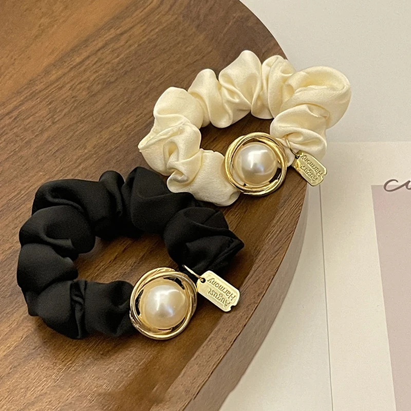 Simple Vintage Big Pearl Elastic Hair Tie Girls Ponytail Scrunchies Fashion Hair Rubber Band Women Headwear Hair Accessories
Simple Vintage Big Pearl Elastic Hair Tie Girls Ponytail Scrunchies Fashion Hair Rubber Band Women Headwear Hair Accessories