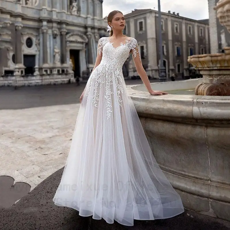 Sexy Ivory Beach Wedding Dress 2022 Lace Appliques Long Sleeves Tulle Bridal Dress White Vintage Wedding Gowns Vestidos De Novia
Sexy Ivory Beach Wedding Dress 2022 Lace Appliques Long Sleeves Tulle Bridal Dress White Vintage Wedding Gowns Vestidos De Novia