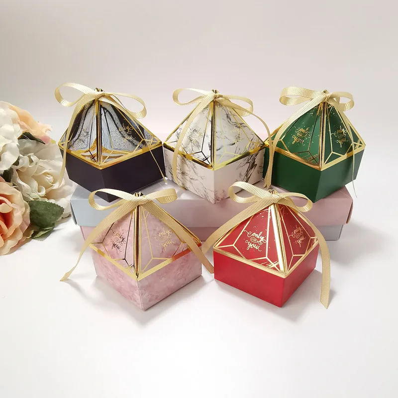 50pcs/set Creative Triangle Wedding Candy Box Hot Stamping Tower-shaped Gem Box with Ribbon Gift Packaging Box Folding Paper Box
50pcs/set Creative Triangle Wedding Candy Box Hot Stamping Tower-shaped Gem Box with Ribbon Gift Packaging Box Folding Paper Box