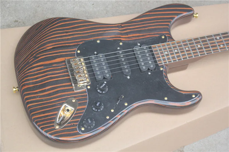 Factory customized new zebra pattern vibrato electric guitar, rosewood fingerboard and HSH pickup, which can be made according t 
Factory customized new zebra pattern vibrato electric guitar, rosewood fingerboard and HSH pickup, which can be made according t