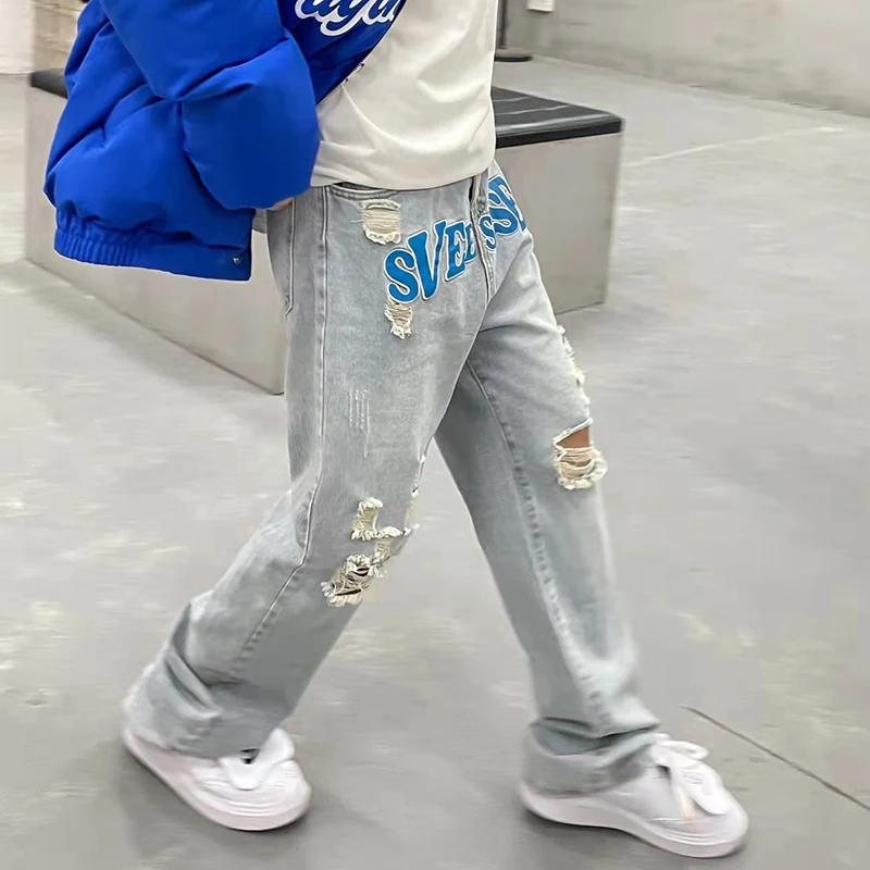 Spring Mens and Womens Hole Letter Embroidery Ripped Retro Jeans Pants Straight Oversize Washed Distressed Casual Denim Trousers
Spring Mens and Womens Hole Letter Embroidery Ripped Retro Jeans Pants Straight Oversize Washed Distressed Casual Denim Trousers