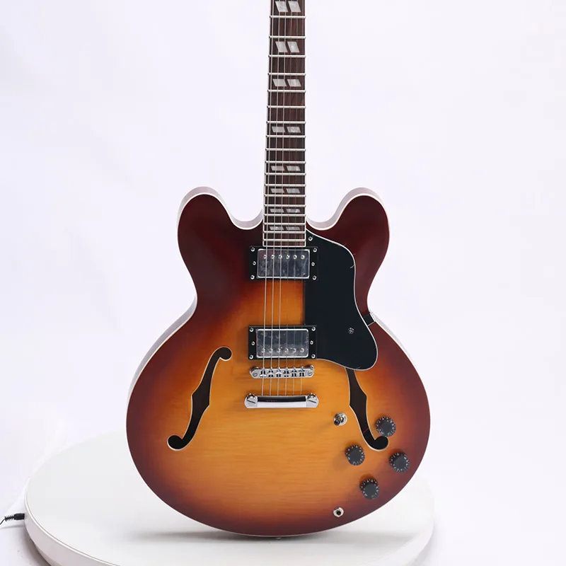 6 String 335 Electric Guitar Sunburst Color White Binding Flamed Maple Top&Back Chrome Hardware Mahogany Neck Free Ship
6 String 335 Electric Guitar Sunburst Color White Binding Flamed Maple Top&Back Chrome Hardware Mahogany Neck Free Ship