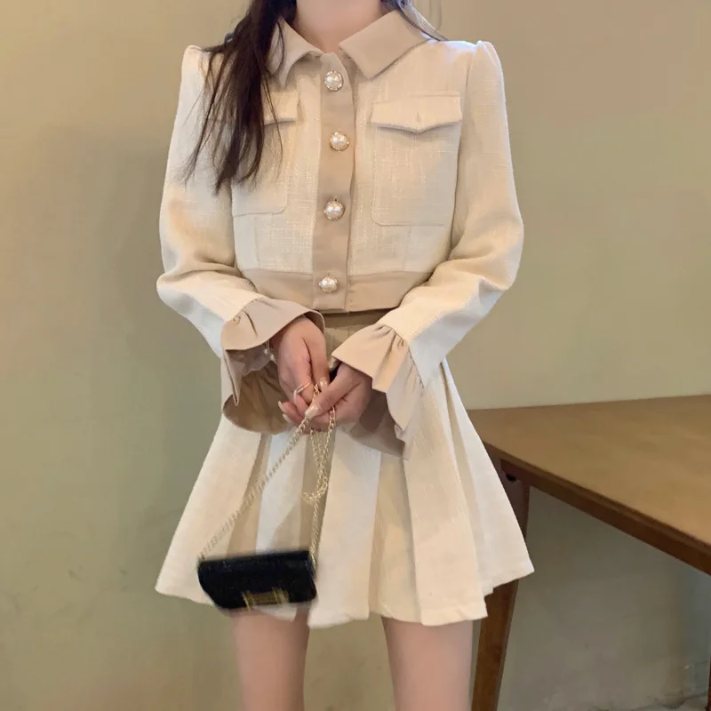 

Укороченный топ на пуговицах с карманами и расклешенными рукавами, куртка, плиссированная юбка, популярный весенний винтажный Женский комплект из двух предметов в Корейском стиле
