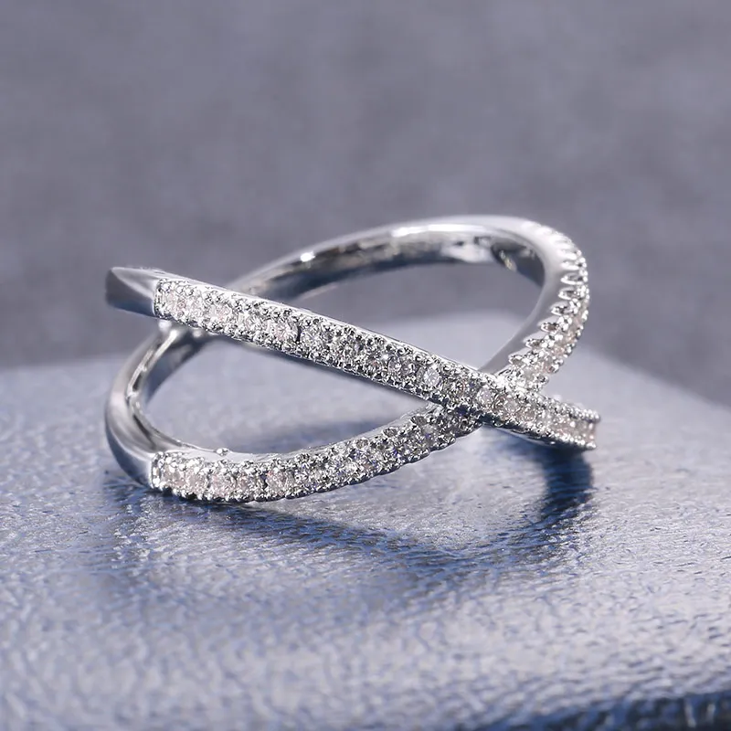 Huitan Luxury Cross X Shape Women Engagement Ring Full Paved CZ Stone Silver Color Elegant Simple Female Jewelry Ring Hot Sale
Huitan Luxury Cross X Shape Women Engagement Ring Full Paved CZ Stone Silver Color Elegant Simple Female Jewelry Ring Hot Sale