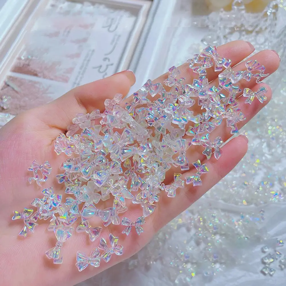 50Pcs/Set Nail Bow Ornament Aurora 3D Resin Manicure Glitter Bowknot DIY Rhinestone for Beautify
50Pcs/Set Nail Bow Ornament Aurora 3D Resin Manicure Glitter Bowknot DIY Rhinestone for Beautify