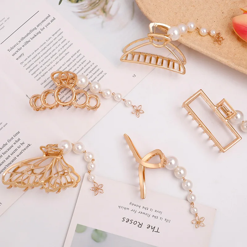 New Pendant Pearl Tassel Grab Clip Hairpin Back Of The Head Shark Clip Elegant Temperament INS Hair Grab
New Pendant Pearl Tassel Grab Clip Hairpin Back Of The Head Shark Clip Elegant Temperament INS Hair Grab