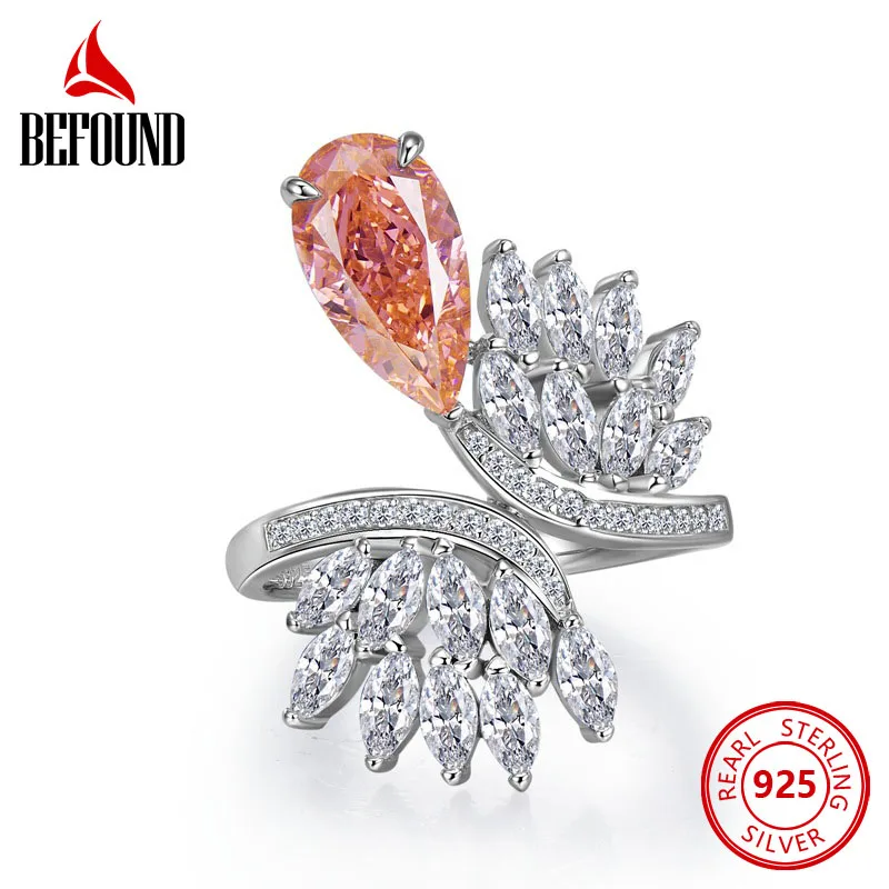 Padparadscha Ring 925 Sterling Silver Wedding Bands Luxury Jewelry Feather Shape Orange High Carbon Diamond Rings for Women
Padparadscha Ring 925 Sterling Silver Wedding Bands Luxury Jewelry Feather Shape Orange High Carbon Diamond Rings for Women