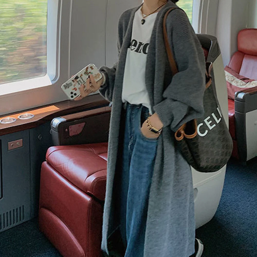 Korean Version Soft Waxy Pure Color Knitted Cardigan Women 2022 New Loose And Lazy Wind Long Sweater Coat
Korean Version Soft Waxy Pure Color Knitted Cardigan Women 2022 New Loose And Lazy Wind Long Sweater Coat