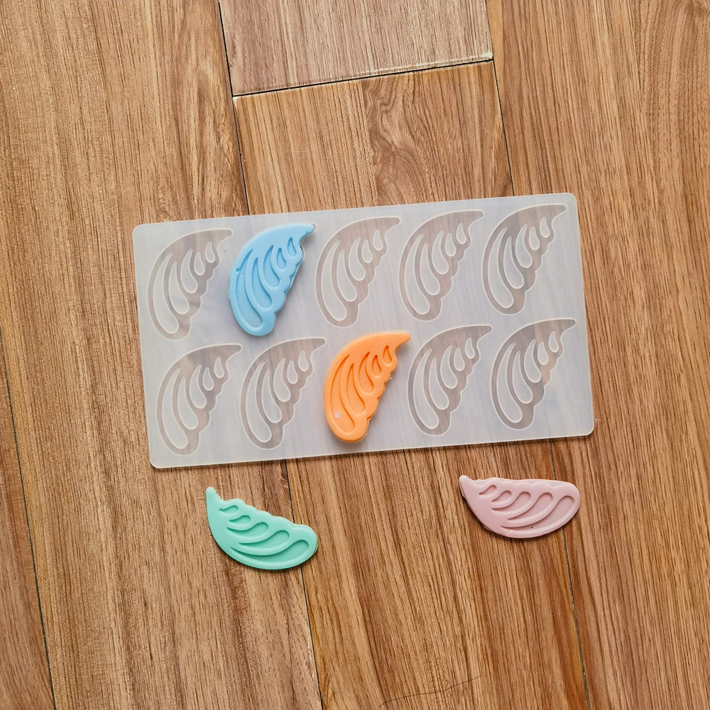 Wings chocolate silicone mold DIY candy pudding dessert mold cake decoration plugin kitchen baking utensils
Wings chocolate silicone mold DIY candy pudding dessert mold cake decoration plugin kitchen baking utensils