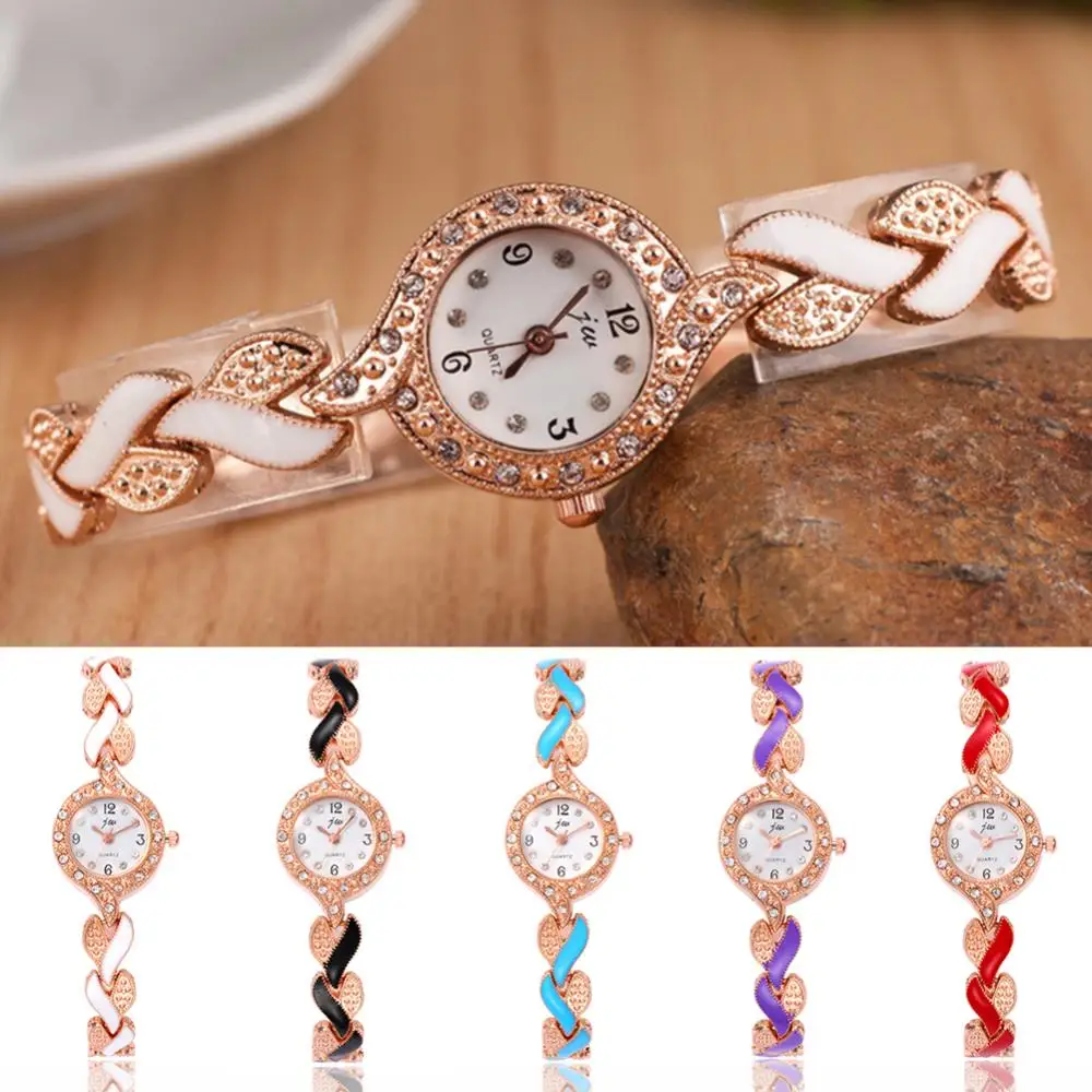 Fashion Womens Watch Rhinestone Round Dial Leaf Linked Thin Strap Quartz Wrist Watch
Fashion Womens Watch Rhinestone Round Dial Leaf Linked Thin Strap Quartz Wrist Watch