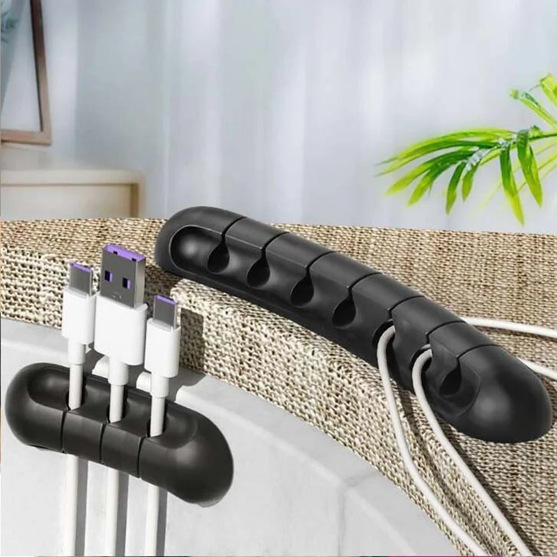 Silicone USB Cable Organiser Desk Winder Desktop Tidy Management Clip Cable Holder Self-Adhesive Cord Storage Organizer Supplies
Silicone USB Cable Organiser Desk Winder Desktop Tidy Management Clip Cable Holder Self-Adhesive Cord Storage Organizer Supplies