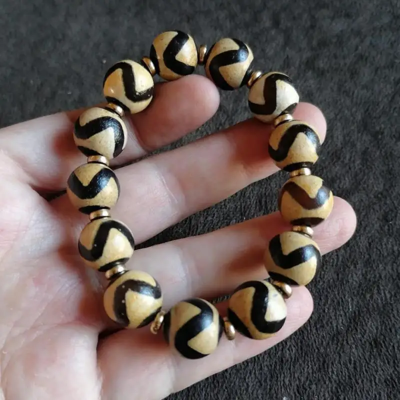 Браслет из тибетского агата Dzi для мужчин и женщин, браслет фэн-шуй, тибетский буддизм, браслет из старого агата, тигра, зуба, бусины Dzi, эласти... 
Браслет из тибетского агата Dzi для мужчин и женщин, браслет фэн-шуй, тибетский буддизм, браслет из старого агата, тигра, зуба, бусины Dzi, эласти...