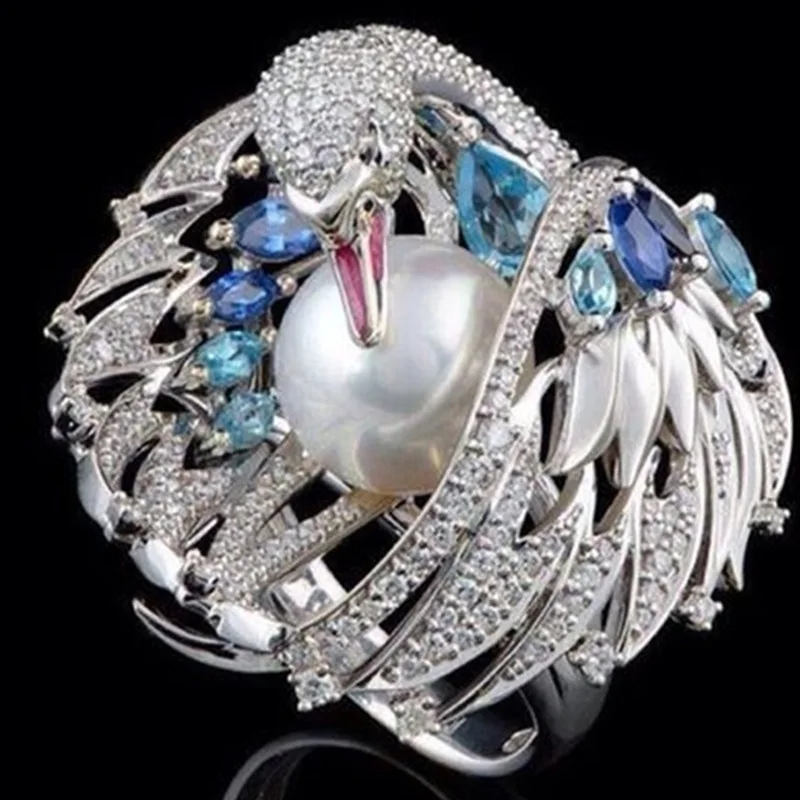 Exquisite Shiny luxury vintage white swan pearl wedding ring Engagement Rings for Women Girl Party Female Jewelry
Exquisite Shiny luxury vintage white swan pearl wedding ring Engagement Rings for Women Girl Party Female Jewelry