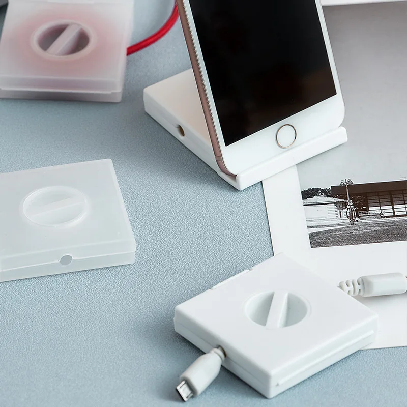 Portable Data Cable Organizer Winder Rotatable Headphone Data Cable Storage Box with Mobile Phone Bracket Cable Organizer
Portable Data Cable Organizer Winder Rotatable Headphone Data Cable Storage Box with Mobile Phone Bracket Cable Organizer