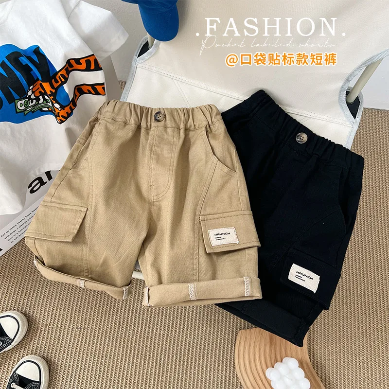2022 summer edition boys’Korean edition loose cargo shorts children’s quarter length pants
2022 summer edition boys’Korean edition loose cargo shorts children’s quarter length pants