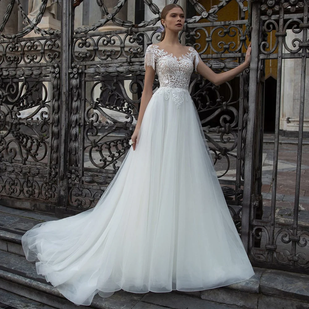 Elegant Lace Appliques Wedding Dress O-neck 2022 Floral Pattern Transparent Bride Gown Button A-line Sweep Train Robe De Mariee
Elegant Lace Appliques Wedding Dress O-neck 2022 Floral Pattern Transparent Bride Gown Button A-line Sweep Train Robe De Mariee
