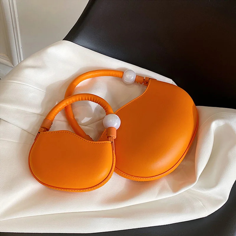 Новые женские сумки на плечо 2022, кошельки и сумочки из искусственной кожи, летние женские модные милые однотонные сумки через плечо с жемчуж...
Новые женские сумки на плечо 2022, кошельки и сумочки из искусственной кожи, летние женские модные милые однотонные сумки через плечо с жемчуж...