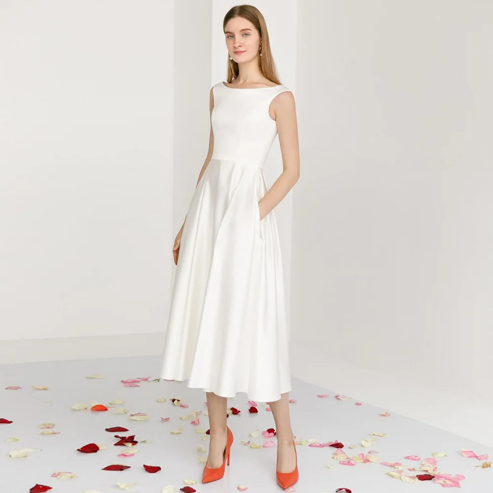 Simple Midi Wedding Dress A Line Pockets Tea Length Modern Bridal Gown Satin Bateau Draped Sleeveless Short Wedding Gown 2022
Simple Midi Wedding Dress A Line Pockets Tea Length Modern Bridal Gown Satin Bateau Draped Sleeveless Short Wedding Gown 2022