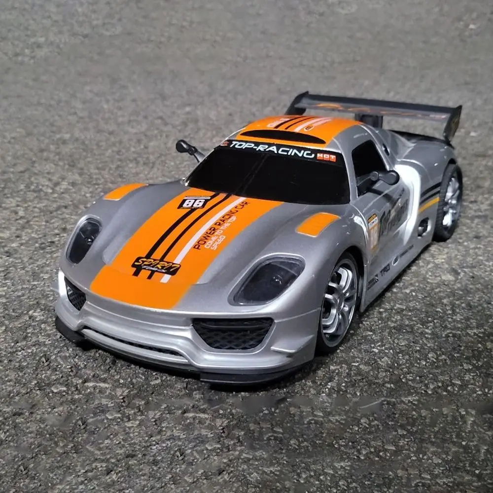 RC Car 1:12 Porsche 2WD 2.4GHz Remote Control Cars Mustang Electric Sport Racing Car Off Road RC Drift Car Vehicle Toys for Boys
RC Car 1:12 Porsche 2WD 2.4GHz Remote Control Cars Mustang Electric Sport Racing Car Off Road RC Drift Car Vehicle Toys for Boys
