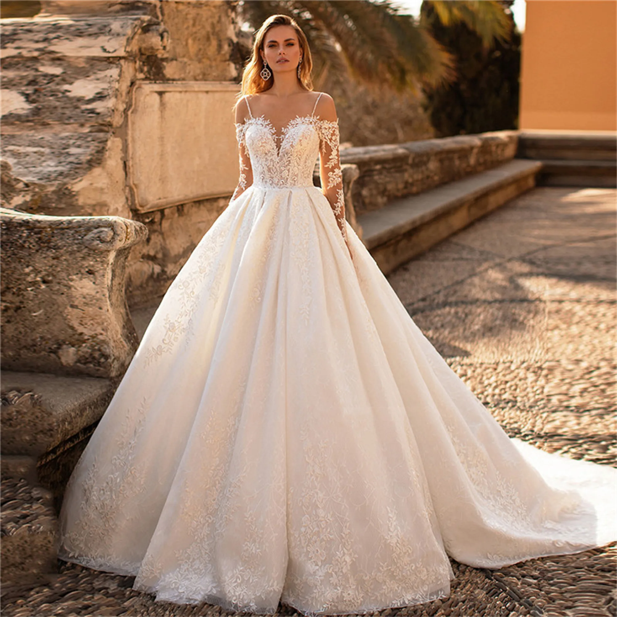 Gorgeous Spaghetti Strips With Long Sleeves Wedding Dresses With Buttons Back Ball Gown Bridal Gowns Spring Fashionable
Gorgeous Spaghetti Strips With Long Sleeves Wedding Dresses With Buttons Back Ball Gown Bridal Gowns Spring Fashionable