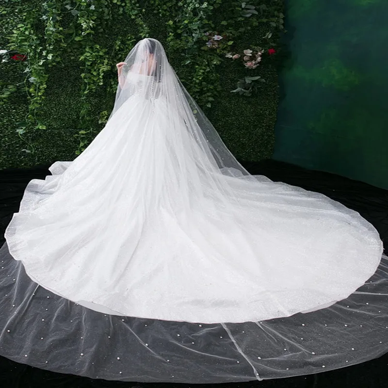 Exquisite and luxurious Overlength Dress photo accessories Wedding veil bride Manual bead nailing Faux Pearl Decor Bridal Veil
Exquisite and luxurious Overlength Dress photo accessories Wedding veil bride Manual bead nailing Faux Pearl Decor Bridal Veil